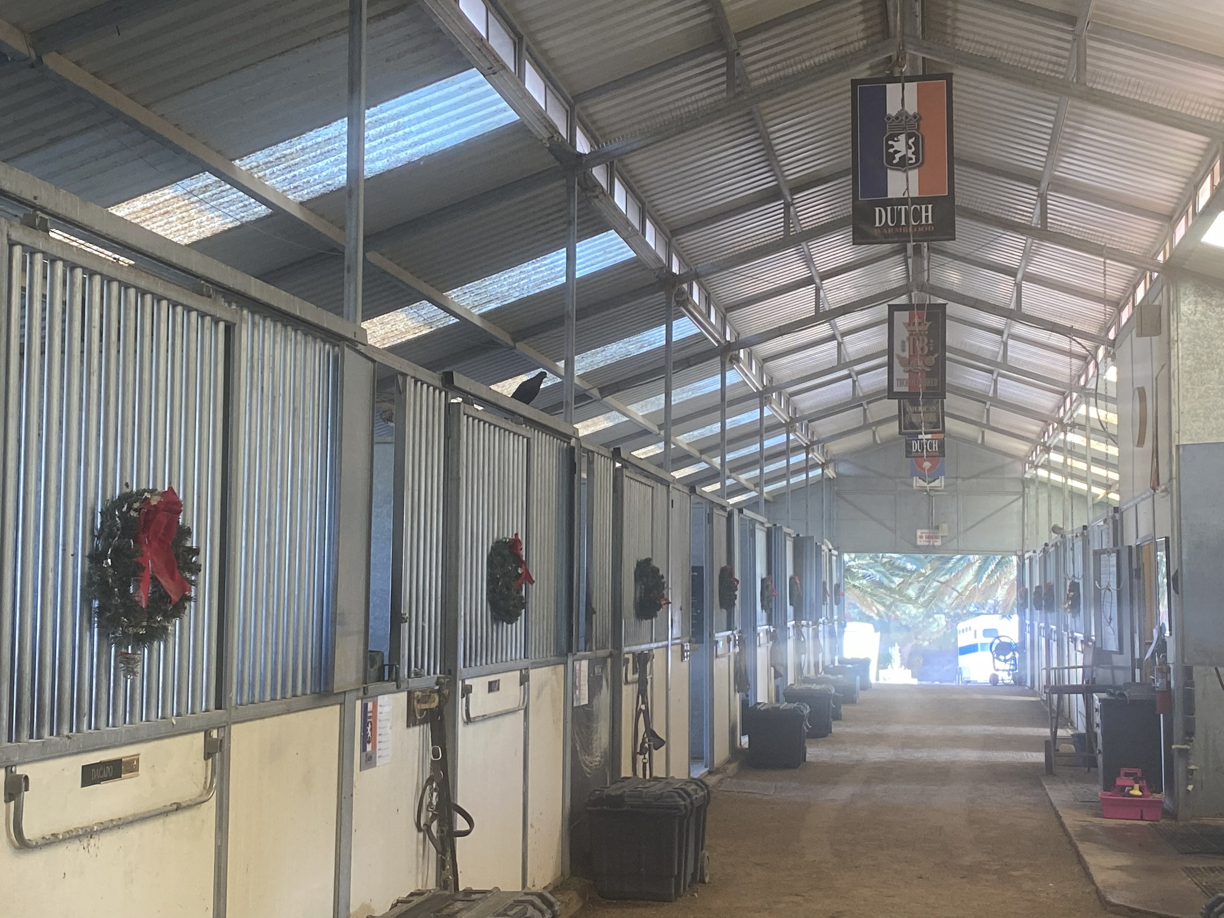 Windrock Farm stable interior with stalls and banners